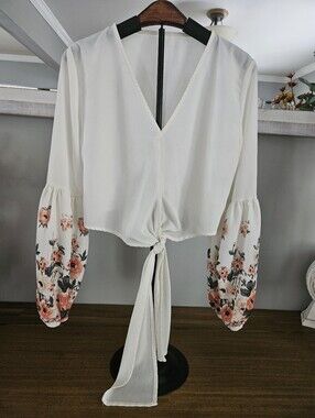 Womens blouse from Shein,Small, off white color with floral sleeves.
